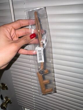 Beis  Tan Leather Letter E Bag Charm